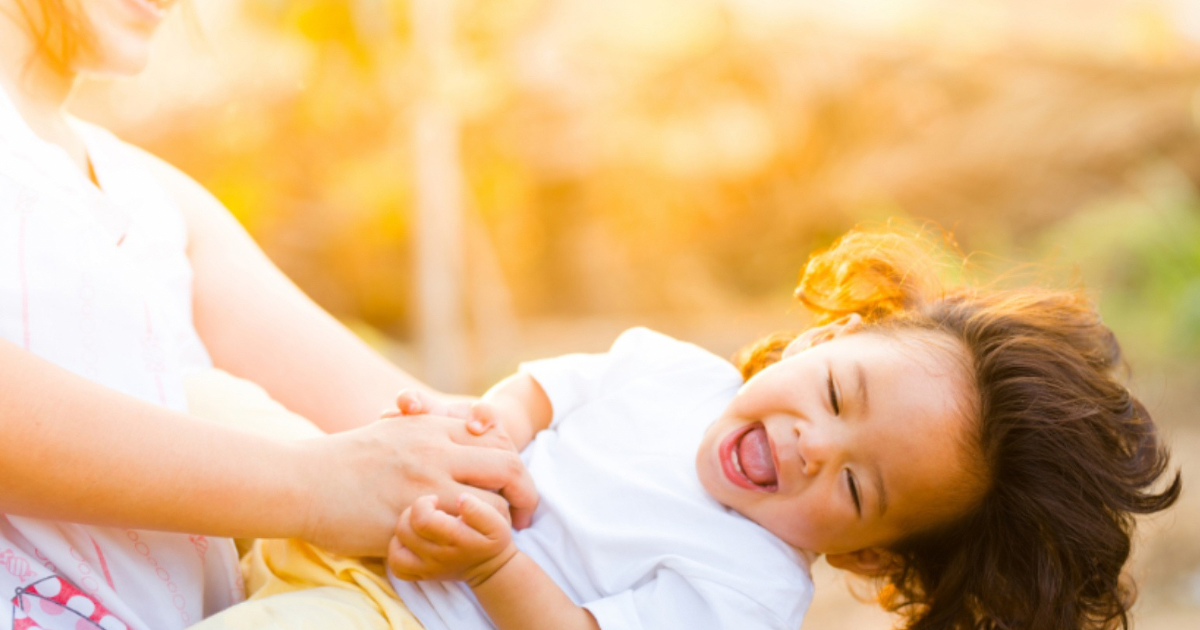 Copy of Blog Featured Image Template Mom and daughter enjoying a sunny day outdoors, symbolizing healthy vitamin D absorption.